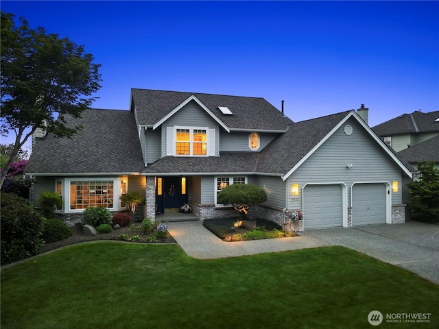 2601 59th St SW, Everett, WA 98203 - traditional home featuring a garage, concrete driveway, a front yard, a porch, and roof with shingles