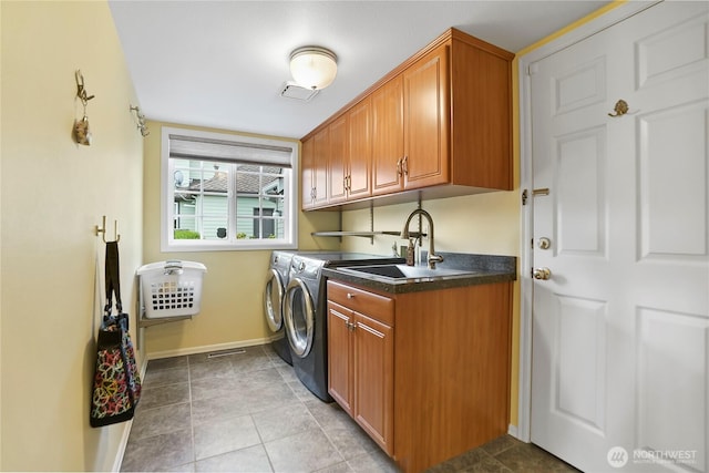 2601 59th St SW, Everett, WA 98203 - clothes washing area with separate washer and dryer, cabinet space, and baseboards
