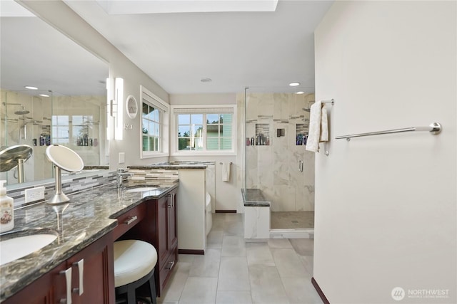 2601 59th St SW, Everett, WA 98203 - bathroom featuring a shower stall, double vanity, recessed lighting, and tile patterned floors