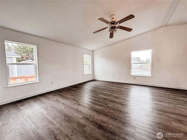 700 N Reed St Unit 72, Sedro Woolley, WA 98284 - empty room with vaulted ceiling, dark wood-type flooring, ceiling fan, and baseboards
