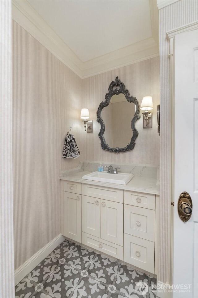 4217 Lakeridge Dr E, Lake Tapps, WA 98391 - bathroom featuring crown molding, wallpapered walls, vanity, and baseboards