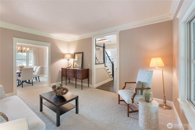 4217 Lakeridge Dr E, Lake Tapps, WA 98391 - living area with ornamental molding, a chandelier, stairs, carpet, and baseboards