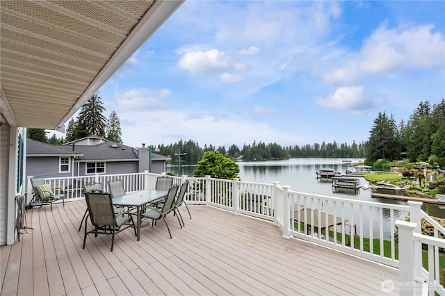 4217 Lakeridge Dr E, Lake Tapps, WA 98391 - wooden terrace with a water view and outdoor dining area