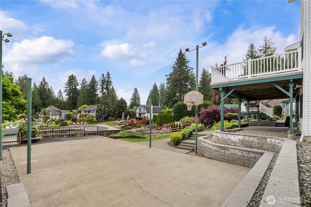 4217 Lakeridge Dr E, Lake Tapps, WA 98391 - view of property's community with stairway, a patio, and a deck