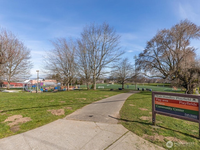 surrounding community with a lawn