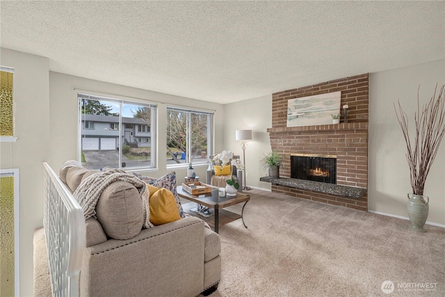 living area featuring carpet floors, a brick fireplace, a textured ceiling, and baseboards