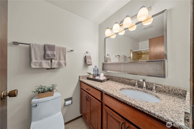 full bath with toilet, a shower with door, vanity, and baseboards