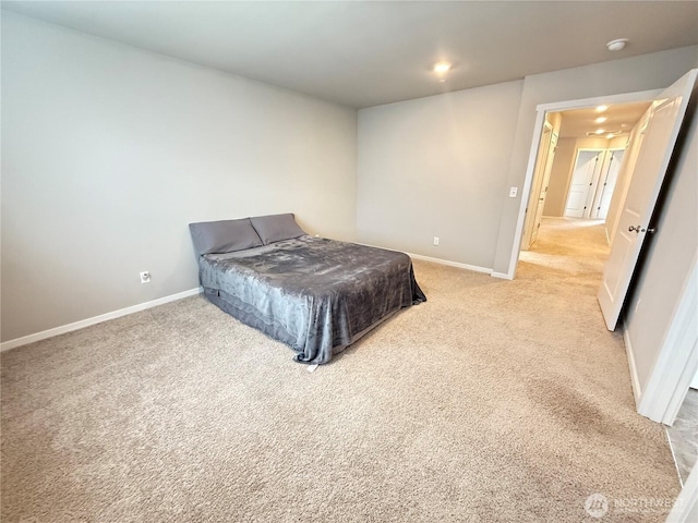 18708 108th Ave SE, Puyallup, WA 98374 - bedroom featuring light colored carpet and baseboards