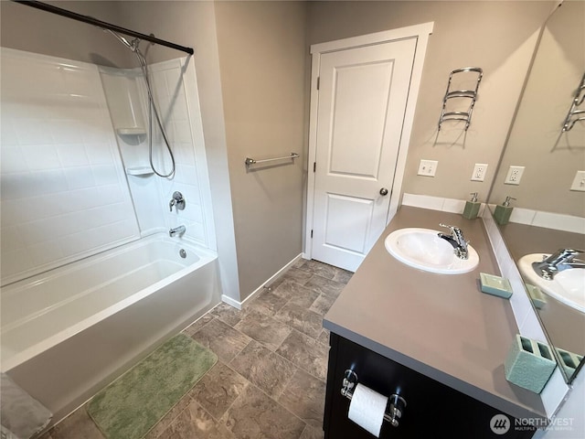 18708 108th Ave SE, Puyallup, WA 98374 - full bathroom featuring tub / shower combination, vanity, baseboards, and stone finish flooring