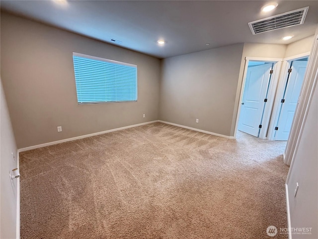 18708 108th Ave SE, Puyallup, WA 98374 - spare room with carpet, baseboards, and recessed lighting