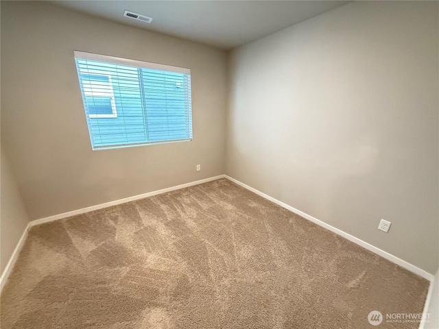 18708 108th Ave SE, Puyallup, WA 98374 - unfurnished room with baseboards and carpet flooring
