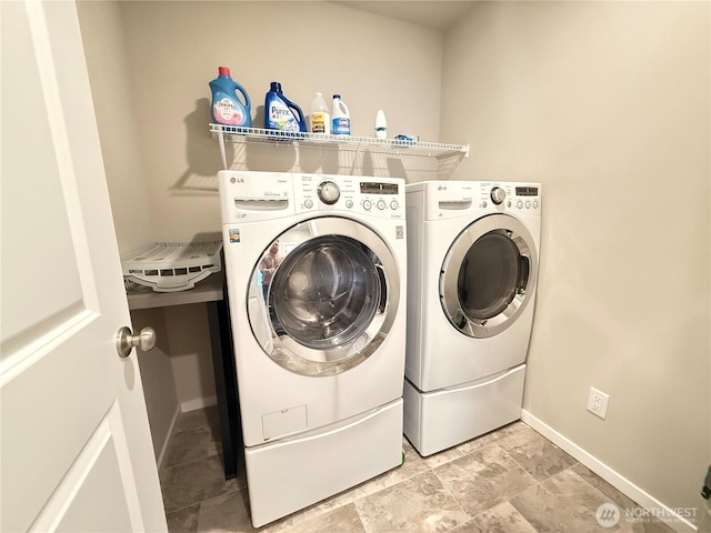 18708 108th Ave SE, Puyallup, WA 98374 - laundry room featuring independent washer and dryer and baseboards