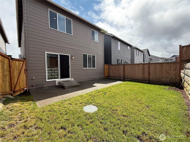 18708 108th Ave SE, Puyallup, WA 98374 - rear view of house with a patio