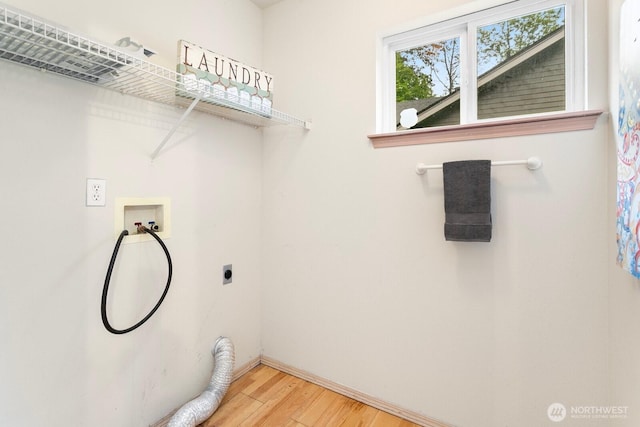 laundry room featuring light wood-style flooring, washer hookup, hookup for an electric dryer, and baseboards