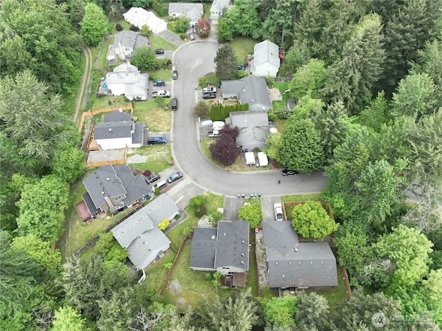 aerial overview of property's location with nearby suburban area