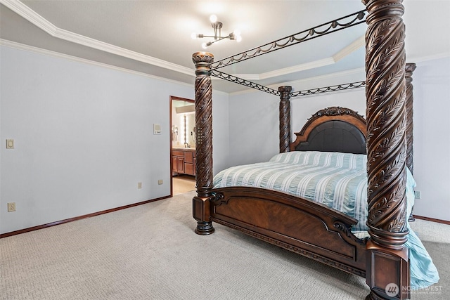 16915 32nd Ave E, Tacoma, WA 98446 - carpeted bedroom featuring ornamental molding, baseboards, connected bathroom, and a sink