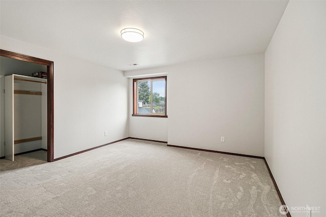 16915 32nd Ave E, Tacoma, WA 98446 - unfurnished bedroom featuring carpet and baseboards