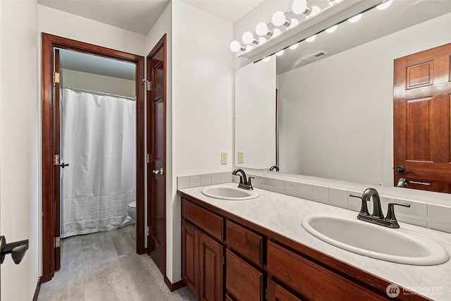 16915 32nd Ave E, Tacoma, WA 98446 - bathroom featuring toilet and double vanity
