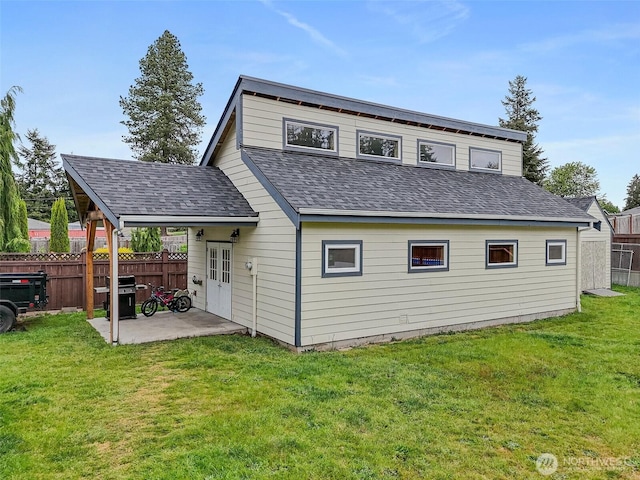 16915 32nd Ave E, Tacoma, WA 98446 - rear view of property featuring a patio area and a shingled roof