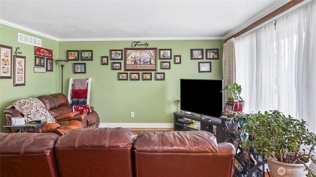 1102 E Elm St, Othello, WA 99344 - living area featuring crown molding and baseboards