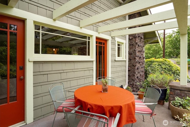 view of patio with outdoor dining area
