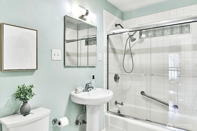 4124 SW 104th St, Seattle, WA 98146 - bathroom with bath / shower combo with glass door and toilet