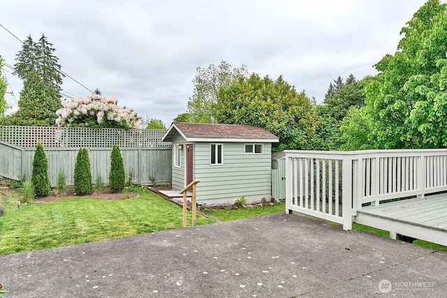 4124 SW 104th St, Seattle, WA 98146 - view of patio with an outbuilding, a deck, and a shed