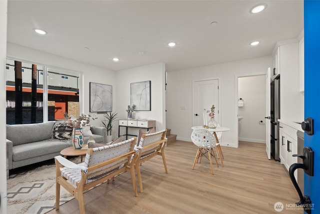 1050C S Donovan St, Seattle, WA 98108 - living room with light wood-style flooring, recessed lighting, and baseboards