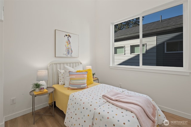1050C S Donovan St, Seattle, WA 98108 - bedroom with wood finished floors and baseboards