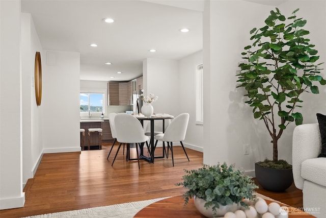 5903 19th Ave S, Seattle, WA 98108 - dining space featuring wood finished floors and recessed lighting