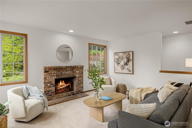 8484 NE County Park Rd, Bainbridge Island, WA 98110 - carpeted living room with plenty of natural light, a fireplace, and recessed lighting