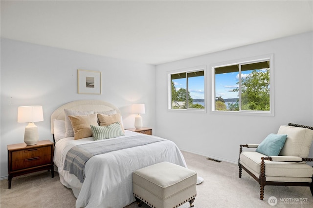 8484 NE County Park Rd, Bainbridge Island, WA 98110 - carpeted bedroom featuring baseboards