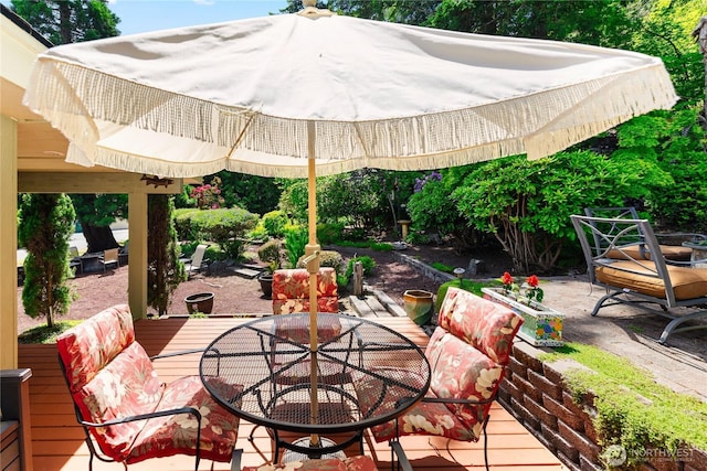 495 Colville Ln, Conner, WA 98257 - view of patio / terrace with outdoor dining area