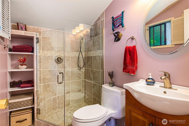 495 Colville Ln, Conner, WA 98257 - full bath featuring a stall shower, vanity, and toilet