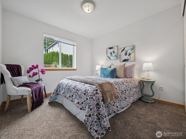 carpeted bedroom with baseboards