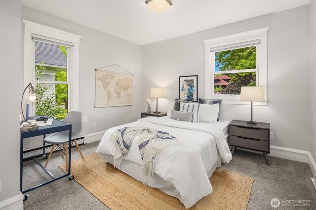 421 16th Ave E, Seattle, WA 98112 - carpeted bedroom with baseboard heating, baseboards, and an office area