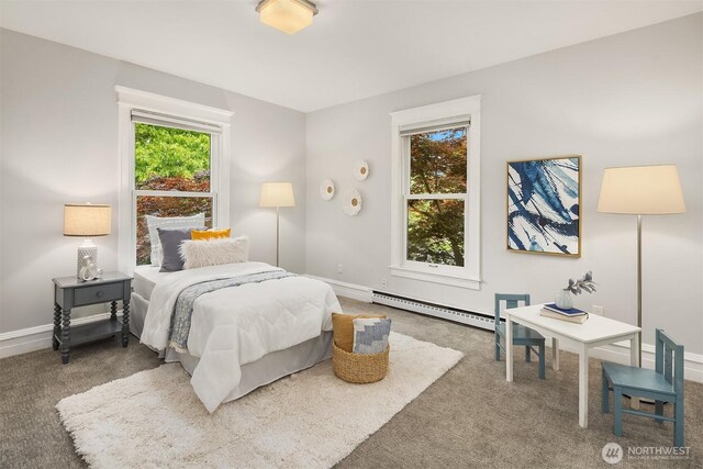 421 16th Ave E, Seattle, WA 98112 - carpeted bedroom with a baseboard radiator and baseboards