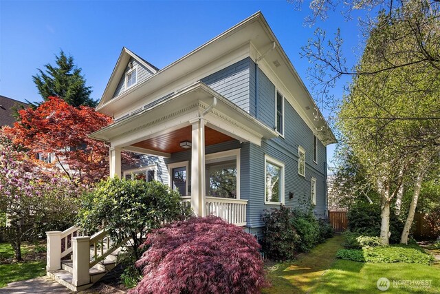 421 16th Ave E, Seattle, WA 98112 - view of side of property featuring a porch