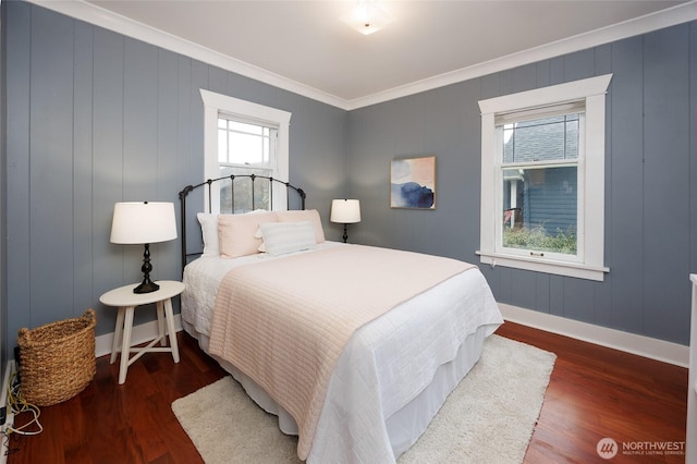 411 NW 56th St, Seattle, WA 98107 - bedroom with crown molding, wood finished floors, and baseboards