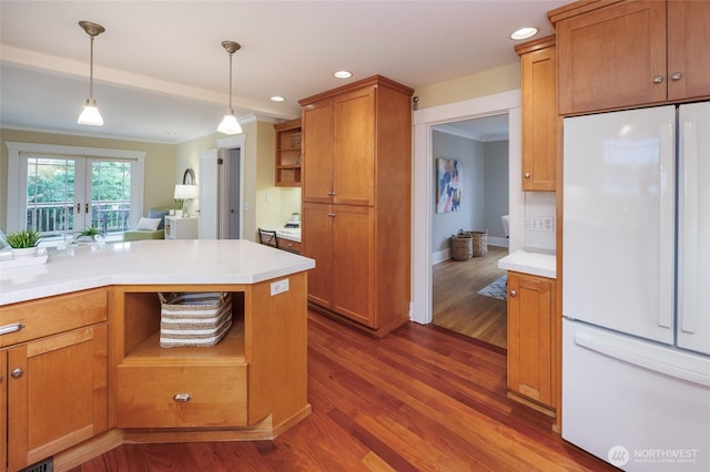 411 NW 56th St, Seattle, WA 98107 - kitchen featuring freestanding refrigerator, dark wood-style floors, pendant lighting, light countertops, and recessed lighting
