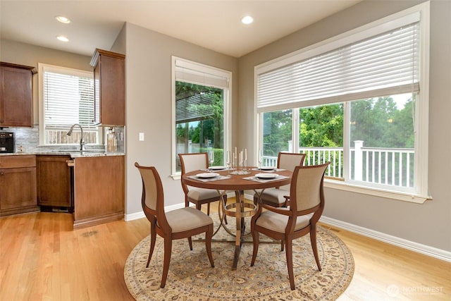3612 Spyglass Dr NE, Tacoma, WA 98422 - dining space with light wood-type flooring, plenty of natural light, baseboards, and recessed lighting