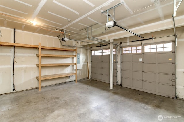 3612 Spyglass Dr NE, Tacoma, WA 98422 - garage with electric panel and a garage door opener