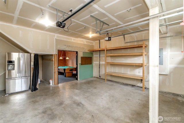 3612 Spyglass Dr NE, Tacoma, WA 98422 - garage with stainless steel fridge, a garage door opener, and electric panel