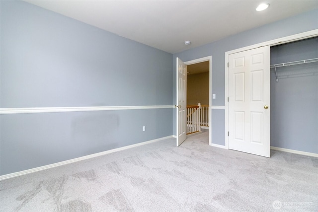 3612 Spyglass Dr NE, Tacoma, WA 98422 - unfurnished bedroom featuring carpet flooring, baseboards, and a closet