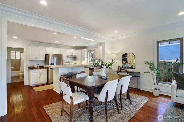 7508 13th Ave SW, Seattle, WA 98106 - dining space with ornamental molding, dark wood-style floors, recessed lighting, and baseboards