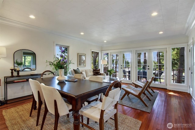 7508 13th Ave SW, Seattle, WA 98106 - dining room featuring crown molding, hardwood / wood-style floors, french doors, recessed lighting, and baseboards