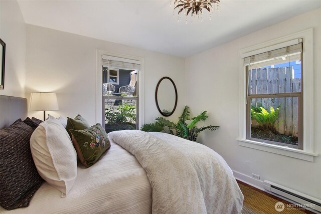 7508 13th Ave SW, Seattle, WA 98106 - bedroom featuring baseboard heating and baseboards