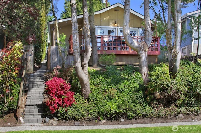7508 13th Ave SW, Seattle, WA 98106 - view of front of property featuring stairway and a wooden deck