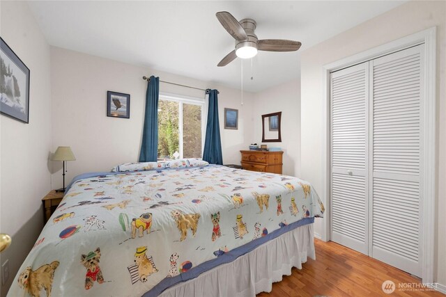 2019 Joe Johns Rd, Ocean Park, WA 98640 - bedroom with a closet, light wood-type flooring, ceiling fan, and baseboards