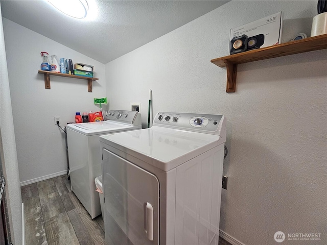 2019 Joe Johns Rd, Ocean Park, WA 98640 - washroom with washer and clothes dryer, wood finished floors, and baseboards